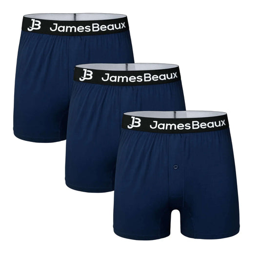 Three pairs of James Beaux men's navy blue bamboo boxer shorts arranged on a white background.